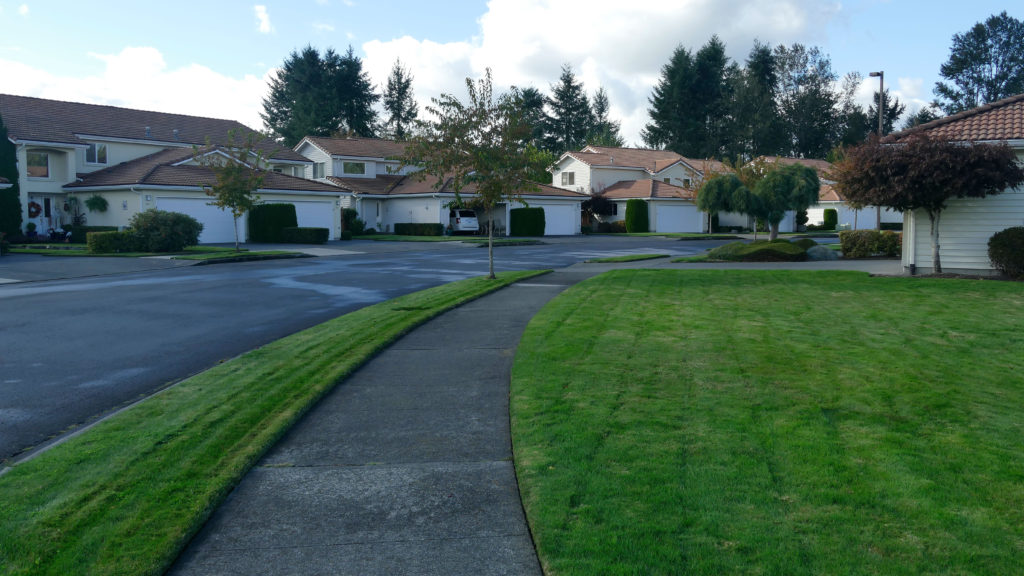 Riviera Court SE bordered by grass and sidewalk